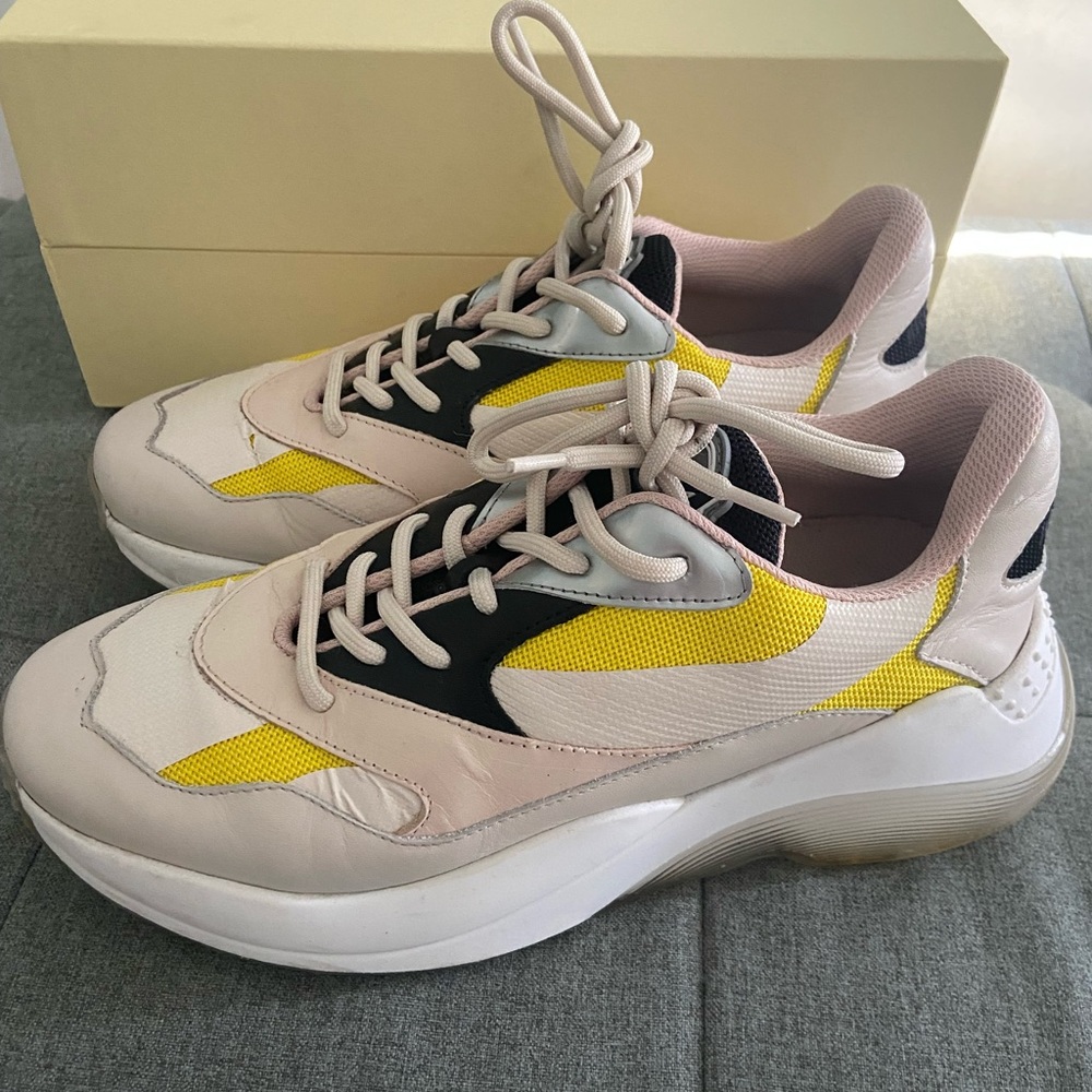 Off white/dusty pink/yellow Swipe Runner sneakers from Axel Arigato